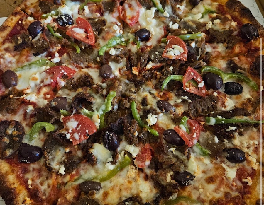 Santorini pizza with gyro meat, feta, and kalamata olives